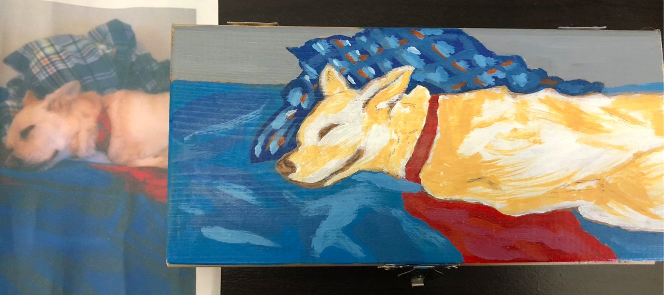 Dog portrait on wooden box