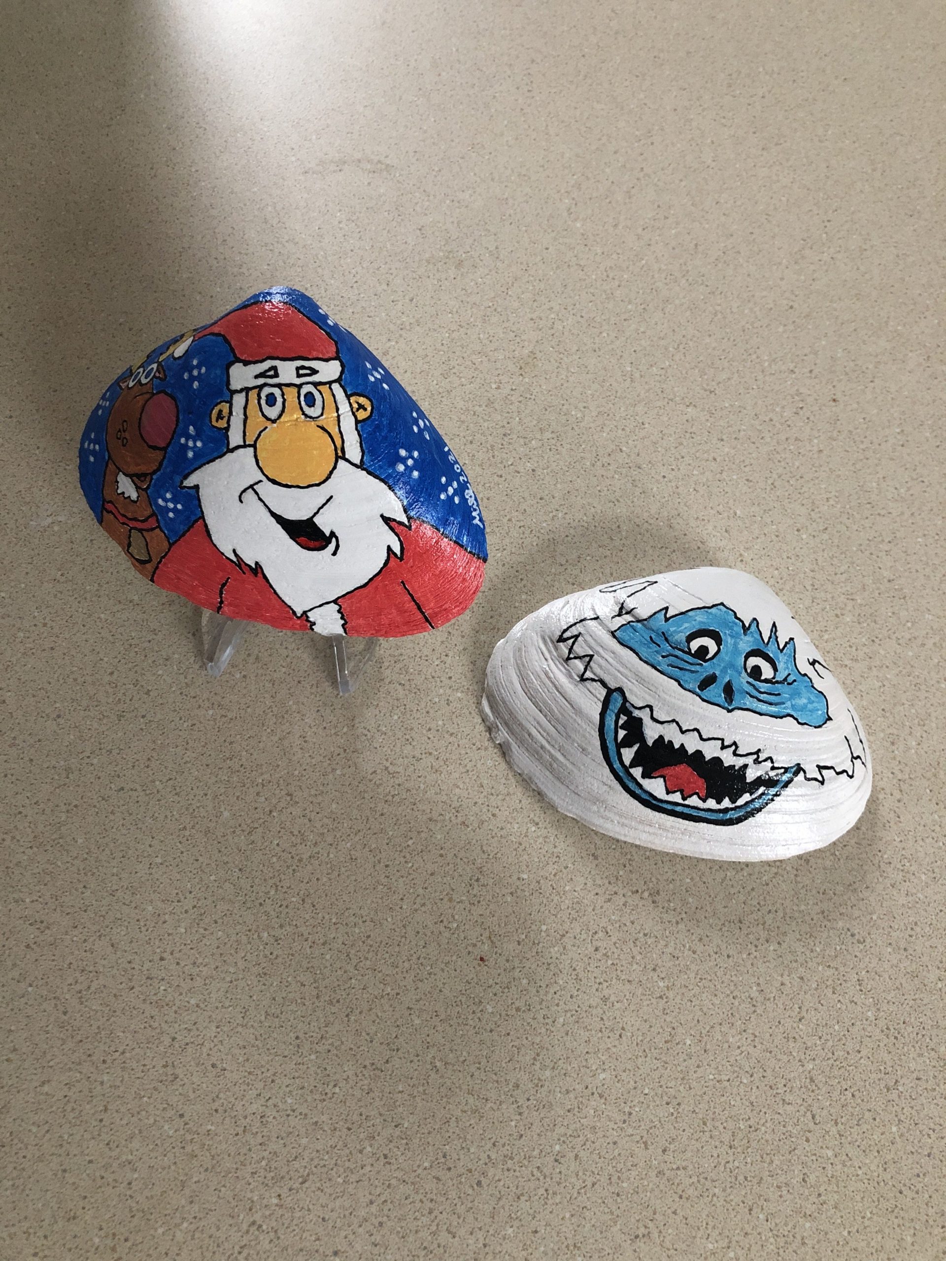 Hand painted Santa and Abominable Snowman on shells