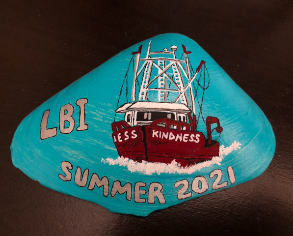 Kindness fishing boat painted on clamshell for LBI summer 2021 giveaway