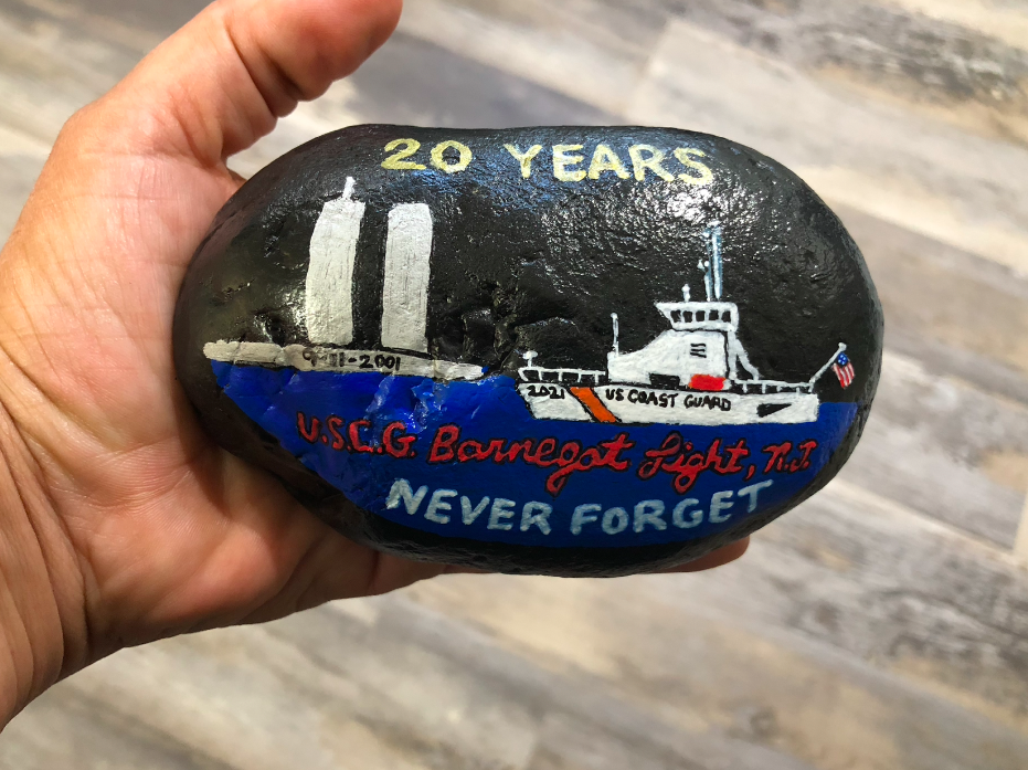 Hand painted 2-lb rock of Barnegat Light's Coast Guard boat approaching the World Trade Center towers