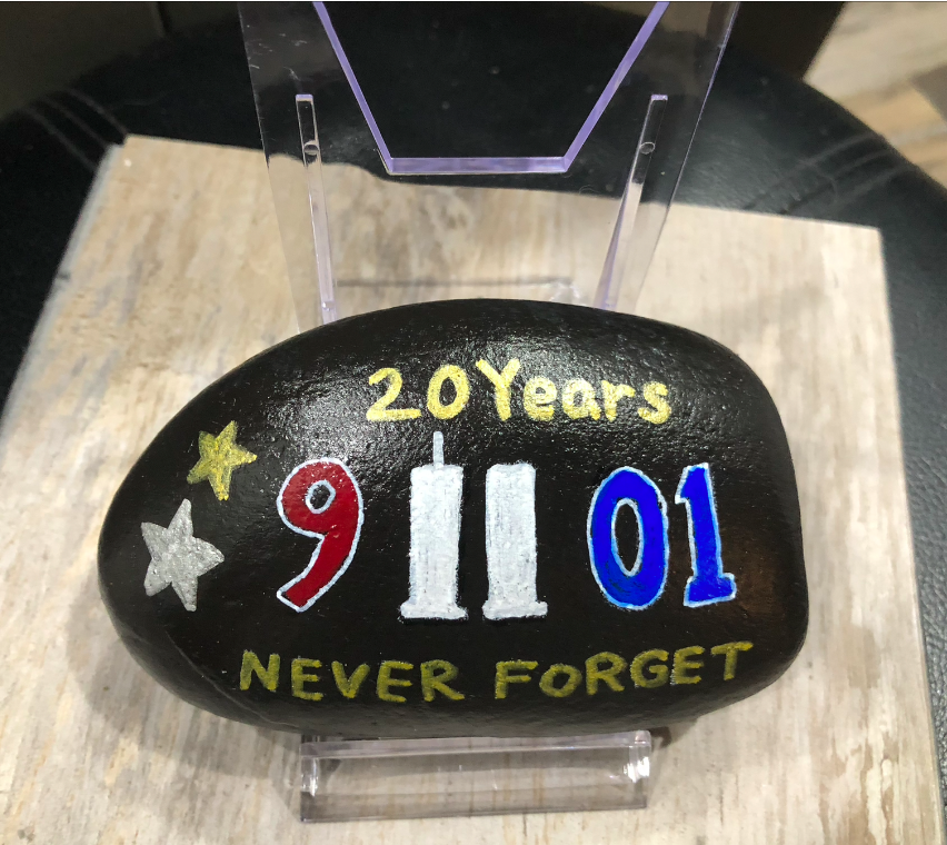 September 11 Never Forget painting on a rock