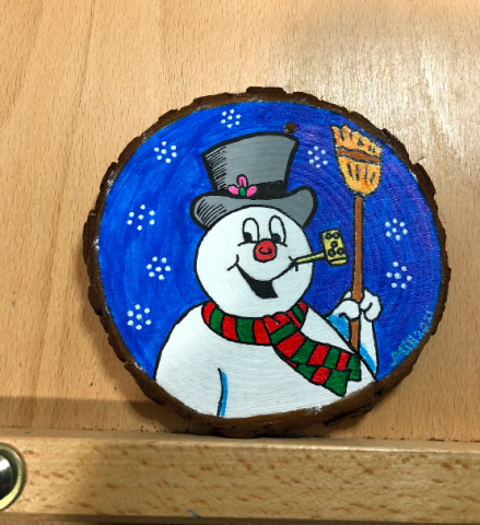 Frosty the Snowman painted on wood slice