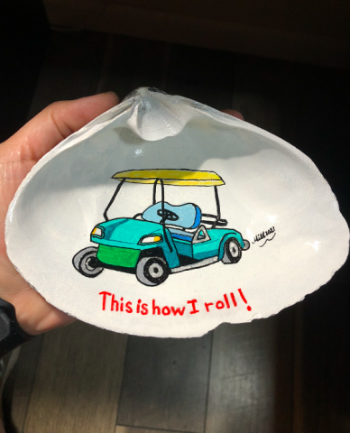 Golf cart painted on clamshell