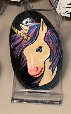 Unicorn painted on a rock